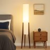 modern-cylinder-floor-lamp-with-wooden-tripod-legs-fabric-lamp-shade