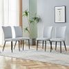 Modern minimalist dining chairs, light gray PU curved backrest and seat cushions, black metal chair legs, suitable for restaurants, bedrooms